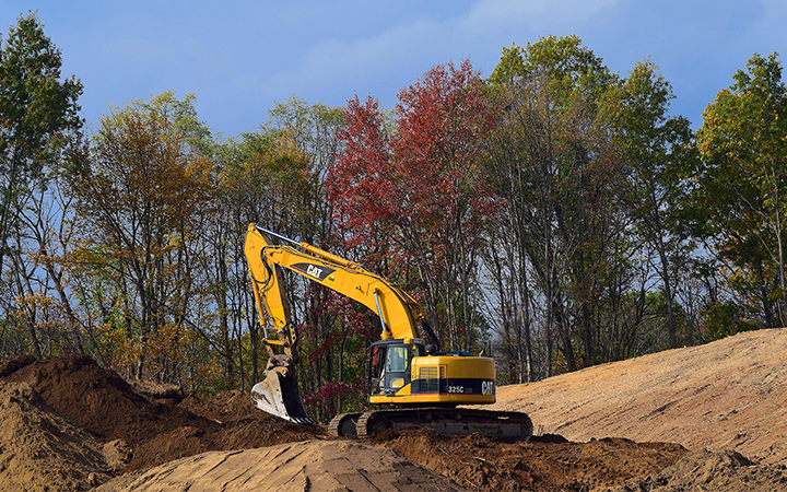 Earthmoving services for roads, pads, and site preparation